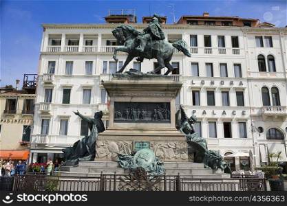 Low angle view of statues in front of a building, Vittorio Emanuele II Statue, Riva Degli Schiavoni, Venice, Italy