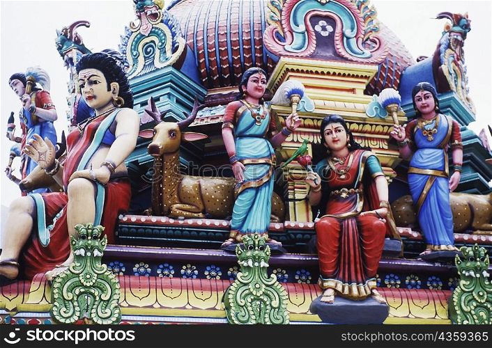 Low angle view of statues on a temple, Singapore