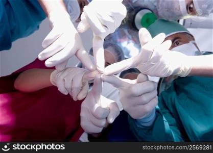 Low angle view of surgeons in an operating room