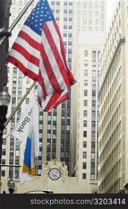 Low angle view of the American flag on a building, Chicago Board of Trade, Chicago, Illinois, USA