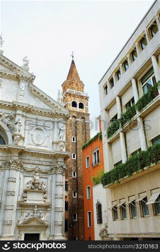 Low angle view of the bell tower and a church, Venice, Italy