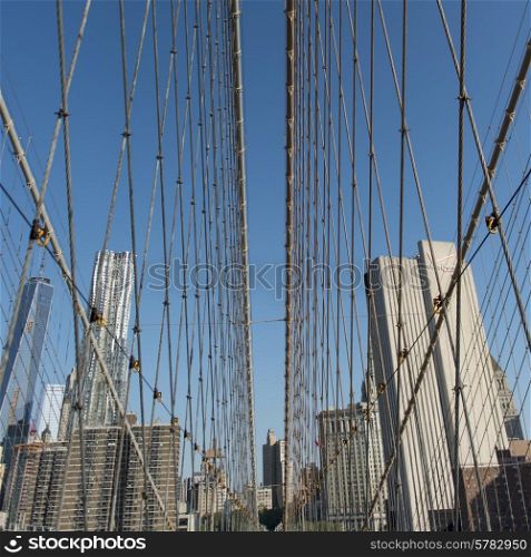 Low angle view of the Brooklyn Bridge with skylines, Manhattan, New York City, New York State, USA