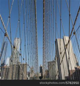 Low angle view of the Brooklyn Bridge with skylines, Manhattan, New York City, New York State, USA