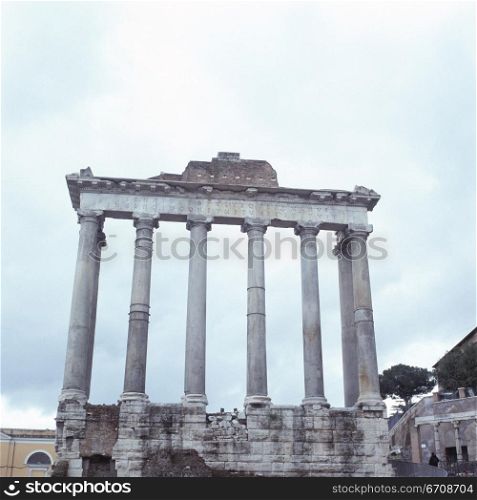 Low angle view of the columns of a monument, Roman Forum, Rome, Italy