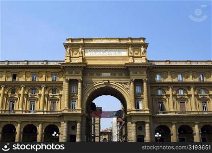 Low angle view of the entrance gate of a market square, Uffizi Museum, Florence, Tuscany, Italy