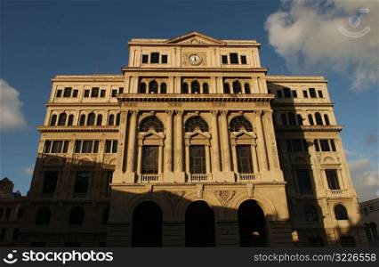 Low angle view of the facade of an ornate commercial building, Havana, Cuba