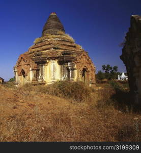 Low angle view of the old ruins of a pagoda, Bagan, Myanmar