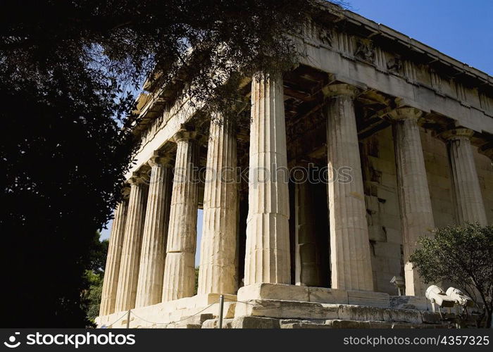 Low angle view of the old ruins of a temple, Parthenon, Acropolis, Athens, Greece