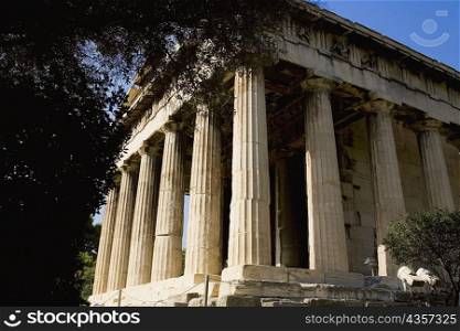 Low angle view of the old ruins of a temple, Parthenon, Acropolis, Athens, Greece
