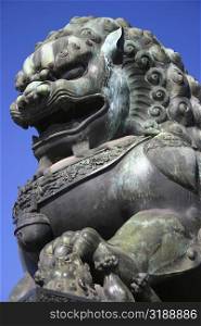 Low angle view of the statue of a lion, Forbidden City, Beijing, China