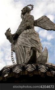 Low angle view of the statue of winged Virgin Mary of Quito, El Panecillo Hill, Quito, Ecuador