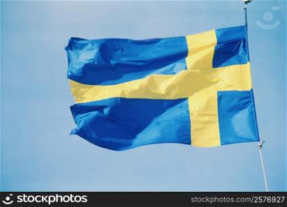 Low angle view of the Swedish flag, Sweden
