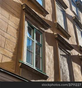 Low angle view of windows of a building, Gamla Stan, Stockholm, Sweden