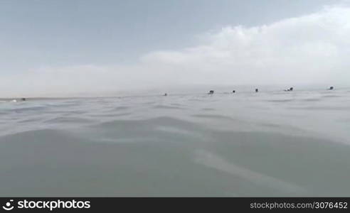 Low angle view toward the beach from water level at Dead Sea