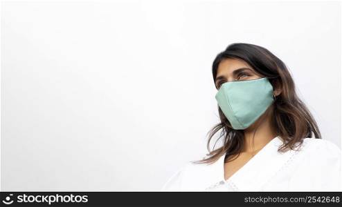 low angle woman with face mask copy space