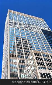 Low angled view of office building in financial district, Manhattan, New York, USA