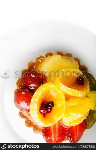Low-calorie fruit cake isolated on white background