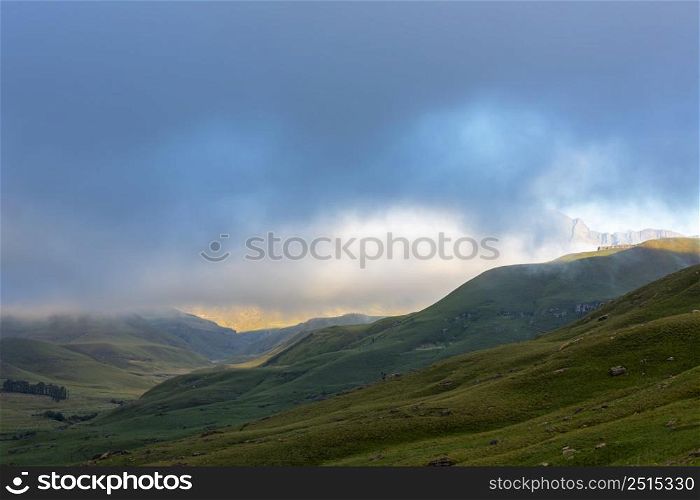 Low clouds in early morning on the mountain Drakensberg South Africa