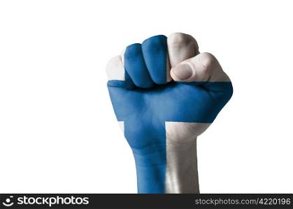 Low key picture of a fist painted in colors of finland flag