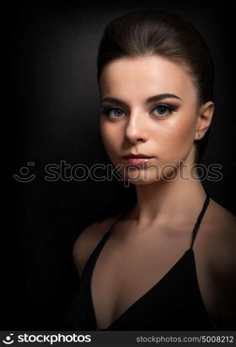 Low key portrait of young girl (color version)