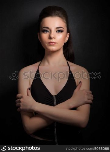 Low key portrait of young woman