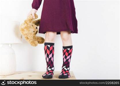low section view girl with stuffed toy
