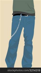 Low section view of a man with a keychain hanging from the belt loop of his trouser