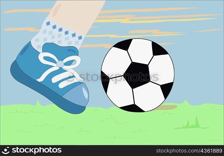 Low section view of a person playing soccer
