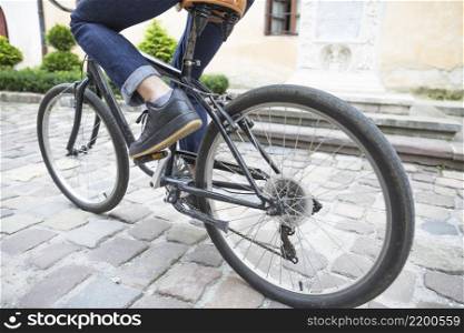 low section view person s feet riding bicycle outdoors
