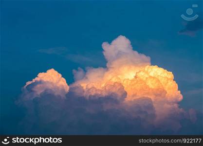 Low view of orange clouds and sunset sky