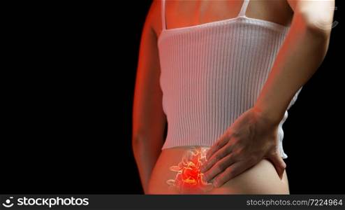 Lower back pain. Woman holding her back in pain. Medical concept.