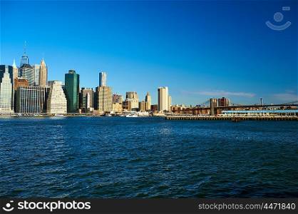 Lower Manhattan skyline and Brooklyn bridge in New York City