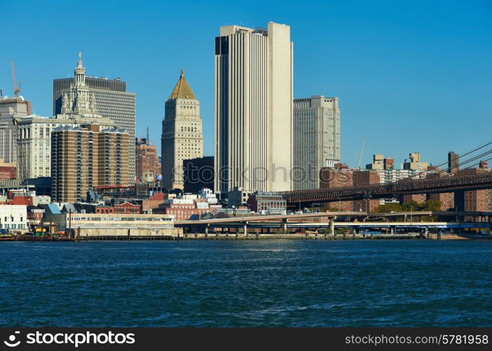 Lower Manhattan skyline and Brooklyn bridge in New York City