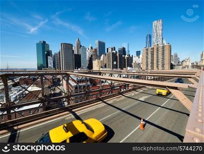 Lower Manhattan skyline view from Brooklyn Bridge in New York City. No brandnames or copyright objects.