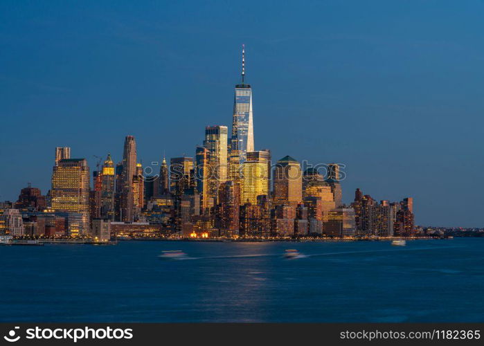 Lower Manhattan which is a apart of New york cityscape river side which can see One world trade center at twilight time, USA, Taking from New Jersey