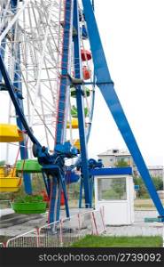 lower part of Ferris wheel with an operator booth beside