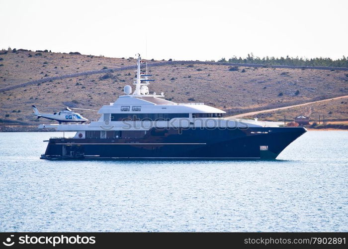 Loxury yacht with helicopter onboard view