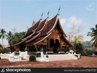 Luang Prabang, Laos - Old ancient Buddha hall with golden facade at Wat Xieng thong, Most Famous tourist attraction in World heritage zone