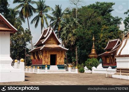 Luang Prabang, Laos - Old ancient Buddha hall with golden facade at Wat Xieng thong, Most Famous tourist attraction in World heritage zone