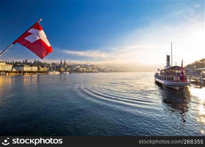 Lucern lake and town waterfront in morning mystic fog view, famous destination in Switzerland