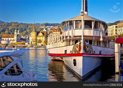 Lucerne waterfront steamboat and architecture view, landmarks of Switzerland