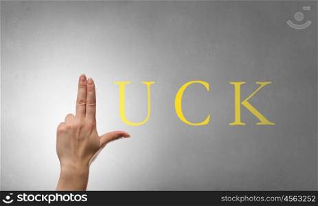 Luck word as concept. Luck word and fingers instead of letter L