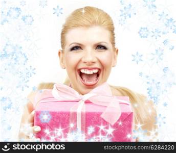 lucky blond with big pink gift box and snowflakes