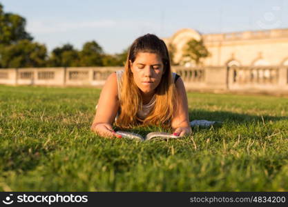 Lucky girl relaxing in the gardens next to the Invalides and the Alexander the 3rd bridge in Paris