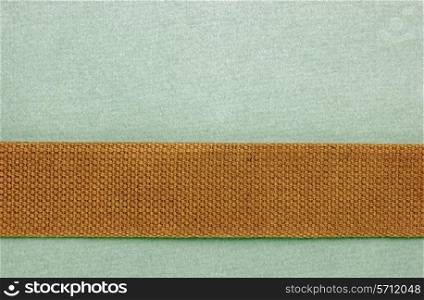 luggage belt on a green background