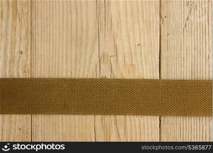 luggage belt on a wooden board