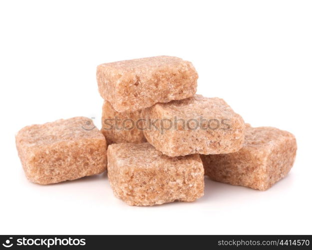 Lump brown cane sugar cubes isolated on white background