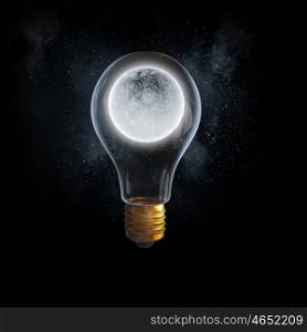 Lunar light bulb. Glass light bulb with moon planet inside