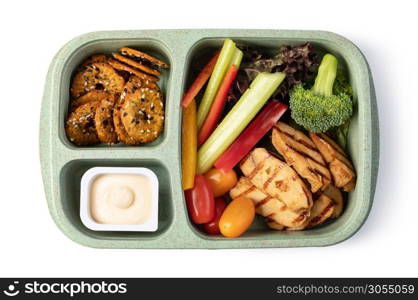 Lunch box with delicious food isolated on a white background. Lunch box with delicious food on a white background