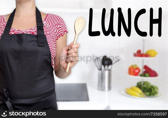Lunch cook holding wooden spoon background.. Lunch cook holding wooden spoon background
